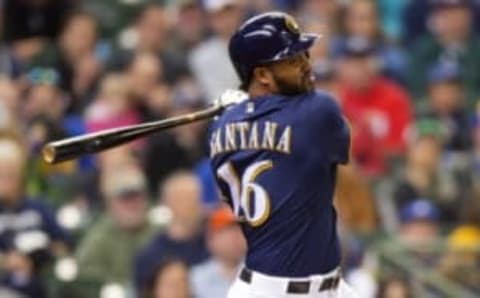 May 1, 2016; Milwaukee, WI, USA; Milwaukee Brewers right fielder Domingo Santana (16) hits an RBI single during the third inning against the Miami Marlins at Miller Park. Mandatory Credit: Jeff Hanisch-USA TODAY Sports