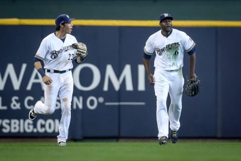 MILWAUKEE, WISCONSIN – MARCH 28: Christian Yelich #22 and Lorenzo Cain #6 of the Milwaukee Brewers celebrate after beating the St. Louis Cardinals 5-4 during Opening Day at Miller Park on March 28, 2019 in Milwaukee, Wisconsin. (Photo by Dylan Buell/Getty Images)