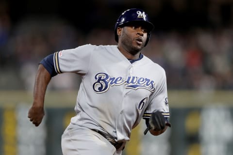 DENVER, COLORADO – SEPTEMBER 28: Lorenzo Cain #6 of the Milwaukee Brewers rounds third base in an attempt to score on a Ben Gamel single in the ninth inning against the Colorado Rockies at Coors Field on September 28, 2019 in Denver, Colorado. (Photo by Matthew Stockman/Getty Images)