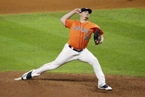 HOUSTON, TEXAS – OCTOBER 30: Will Harris #36 of the Houston Astros delivers the pitch against the Washington Nationals during the seventh inning in Game Seven of the 2019 World Series at Minute Maid Park on October 30, 2019 in Houston, Texas. (Photo by Bob Levey/Getty Images)