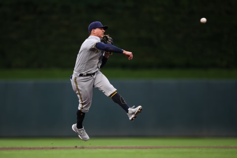 MINNEAPOLIS, MN – AUGUST 28: Luis Urias #2 of the Milwaukee Brewers throws the ball to first base to get out Max Kepler of the Minnesota Twins in the second inning of the game at Target Field on August 28, 2021 in Minneapolis, Minnesota. (Photo by David Berding/Getty Images)