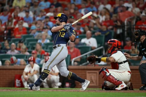 ST. LOUIS, MO – AUGUST 13: Hunter Renfroe #12 of the Milwaukee Brewers hits an RBI triple during the tenth inning against the St. Louis Cardinals at Busch Stadium on August 13, 2022 in St. Louis, Missouri. (Photo by Scott Kane/Getty Images)