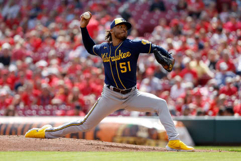 CINCINNATI, OH – SEPTEMBER 25: Freddy Peralta #51 of the Milwaukee Brewers throws a pitch during the second inning of the game against the Cincinnati Reds at Great American Ball Park on September 25, 2022 in Cincinnati, Ohio. (Photo by Kirk Irwin/Getty Images)