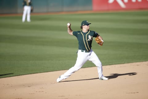 OAKLAND, CA – JULY 11: Sheldon Neuse #21 of the Oakland Athletics fields in an intrasquad game during summer workouts at RingCentral Coliseum on July 11, 2020 in Oakland, California. (Photo by Michael Zagaris/Oakland Athletics/Getty Images)