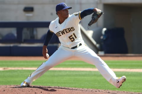 PHOENIX, ARIZONA – MARCH 21: Freddy Peralta #51 of the Milwaukee Brewers pitches in the second inning against the Seattle Mariners during the MLB spring training game at American Family Fields of Phoenix on March 21, 2021 in Phoenix, Arizona. (Photo by Abbie Parr/Getty Images)