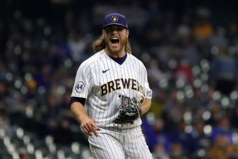 MILWAUKEE, WISCONSIN – APRIL 03: Corbin Burnes #39 of the Milwaukee Brewers reacts to a pitch during the sixth inning against the Minnesota Twins at American Family Field on April 03, 2021 in Milwaukee, Wisconsin. (Photo by Stacy Revere/Getty Images)