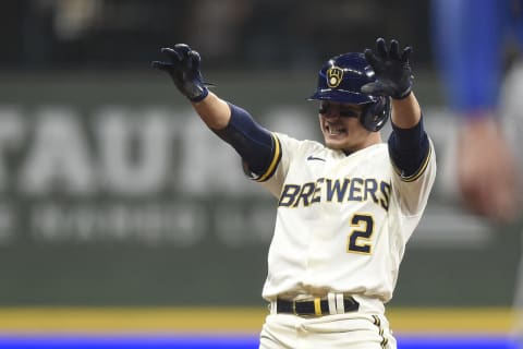 MILWAUKEE, WISCONSIN – JUNE 28: Luis Urias #2 of the Milwaukee Brewers celebrates his RBI double in the eighth inning against the Chicago Cubs at American Family Field on June 28, 2021 in Milwaukee, Wisconsin. (Photo by Patrick McDermott/Getty Images)