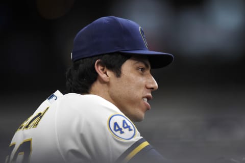 MILWAUKEE, WISCONSIN – JUNE 29: Christian Yelich #22 of the Milwaukee Brewers looks on before a game against the Chicago Cubs at American Family Field on June 29, 2021 in Milwaukee, Wisconsin. (Photo by Patrick McDermott/Getty Images)