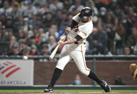 SAN FRANCISCO, CALIFORNIA – AUGUST 30: Brandon Belt #9 of the San Francisco Giants bats against the Milwaukee Brewers in the bottom of the eighth inning at Oracle Park on August 30, 2021 in San Francisco, California. (Photo by Thearon W. Henderson/Getty Images)