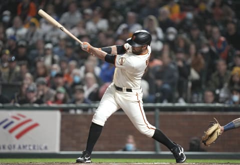 SAN FRANCISCO, CALIFORNIA – AUGUST 30: Brandon Belt #9 of the San Francisco Giants bats against the Milwaukee Brewers in the bottom of the eighth inning at Oracle Park on August 30, 2021 in San Francisco, California. (Photo by Thearon W. Henderson/Getty Images)