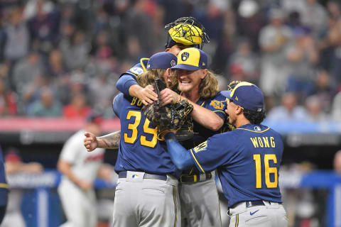 CLEVELAND, OHIO – SEPTEMBER 11: Starting pitcher Corbin Burnes #39 closing pitcher Josh Hader #71 catcher Omar Narvaez #10 and Kolten Wong #16 of the Milwaukee Brewers celebrate after the Brewers defeated the Cleveland Indians with a combined no-hitter at Progressive Field on September 11, 2021 in Cleveland, Ohio. The Brewers defeated the Indians 3-0. (Photo by Jason Miller/Getty Images)