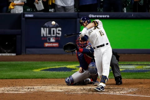 MILWAUKEE, WISCONSIN – OCTOBER 09: Tyrone Taylor #15 of the Milwaukee Brewers swings at a pitch during game 2 of the National League Division Series at American Family Field on October 09, 2021 in Milwaukee, Wisconsin. Braves defeated the Brewers 3-0. (Photo by John Fisher/Getty Images)