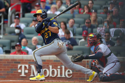 ATLANTA, GEORGIA – OCTOBER 12: Willy Adames #27 of the Milwaukee Brewers hits a base hit during the first inning against the Atlanta Braves in game 4 of the National League Division Series at Truist Park on October 12, 2021 in Atlanta, Georgia. (Photo by Kevin C. Cox/Getty Images)