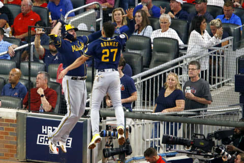 ATLANTA, GEORGIA – OCTOBER 12: Willy Adames #27 of the Milwaukee Brewers and Rowdy Tellez #11 celebrate during the fifth inning against the Atlanta Braves in game four of the National League Division Series at Truist Park on October 12, 2021 in Atlanta, Georgia. (Photo by Michael Zarrilli/Getty Images)