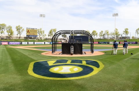 PHOENIX, ARIZONA – MARCH 26: The Milwaukee Brewers take batting practice prior to a spring training game against the Seattle Mariners at American Family Fields of Phoenix on March 26, 2022 in Phoenix, Arizona. (Photo by Norm Hall/Getty Images)