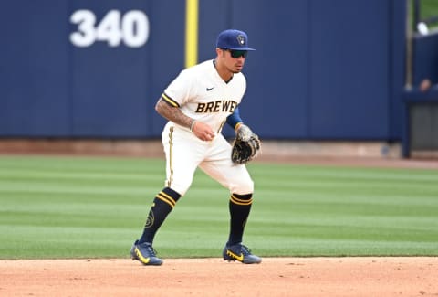 PHOENIX, ARIZONA – MARCH 26: Kolten Wong #16 of the Milwaukee Brewers gets ready to make a play against the Seattle Mariners during a spring training game at American Family Fields of Phoenix on March 26, 2022 in Phoenix, Arizona. (Photo by Norm Hall/Getty Images)