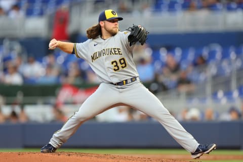 MIAMI, FLORIDA – MAY 13: Corbin Burnes #39 of the Milwaukee Brewers delivers a pitch during the second inning against the Miami Marlins at loanDepot park on May 13, 2022 in Miami, Florida. (Photo by Michael Reaves/Getty Images)