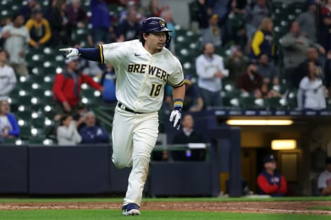 MILWAUKEE, WISCONSIN – MAY 18: Keston Hiura #18 of the Milwaukee Brewers reacts after hitting a walk off two run home run during the eleventh inning against the Atlanta Braves at American Family Field on May 18, 2022 in Milwaukee, Wisconsin. (Photo by Stacy Revere/Getty Images)