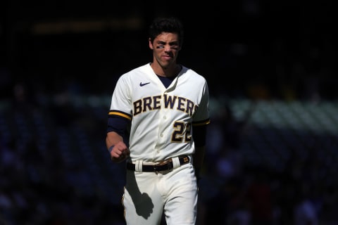 MILWAUKEE, WISCONSIN – AUGUST 29: Christian Yelich #22 of the Milwaukee Brewers walks to the dugout during a game against the Pittsburgh Pirates at American Family Field on August 29, 2022 in Milwaukee, Wisconsin. (Photo by Stacy Revere/Getty Images)