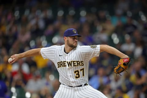 MILWAUKEE, WISCONSIN – SEPTEMBER 10: Adrian Houser #37 of the Milwaukee Brewers throws a pitch during the fifth inning against the Cincinnati Reds at American Family Field on September 10, 2022 in Milwaukee, Wisconsin. (Photo by Stacy Revere/Getty Images)