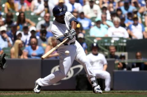 MILWAUKEE, WI – JUNE 13: Lorenzo Cain #6 of the Milwaukee Brewers hits a single in the first inning against the Chicago Cubs at Miller Park on May 27, 2018 in Milwaukee, Wisconsin. (Photo by Dylan Buell/Getty Images)