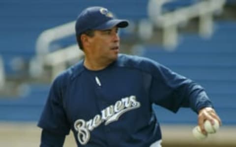 PHOENIX – MARCH 05: Coach Bill Castro #35 of the Milwaukee Brewers throws batting practice before the MLB spring training game against the Oakland Athletics at Maryvale Baseball Park on March 5, 2005 in Phoenix, Arizona. The Brewers won 3-1. (Photo by Christian Petersen/Getty Images)