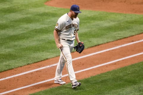 MILWAUKEE, WISCONSIN – AUGUST 25: Brandon Woodruff #53 of the Milwaukee Brewers reacts after getting out of the fifth inning at Miller Park on August 25, 2020 in Milwaukee, Wisconsin. (Photo by Dylan Buell/Getty Images)