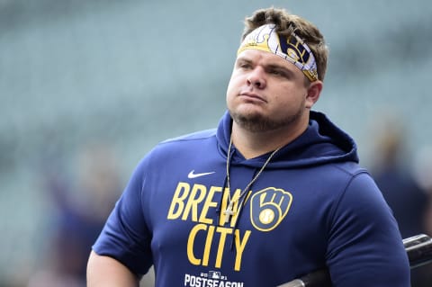 MILWAUKEE, WISCONSIN – OCTOBER 09: Daniel Vogelbach #20 of the Milwaukee Brewers on the field prior to game 2 of the National League Division Series against the Atlanta Braves at American Family Field on October 09, 2021 in Milwaukee, Wisconsin. (Photo by Patrick McDermott/Getty Images)