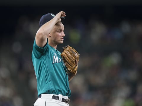 SEATTLE, WA – AUGUST 19: Third baseman Kyle Seager #15 adjusts his cap during a game against the Milwaukee Brewers at Safeco Field on August 19, 2016 in Seattle, Washington. The Mariners won the game 7-6. (Photo by Stephen Brashear/Getty Images)