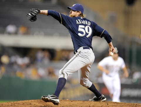 PITTSBURGH, PA – MAY 15: John Axford #59 of the Milwaukee Brewers pitches against the Pittsburgh Pirates on May 15, 2013 at PNC Park in Pittsburgh, Pennsylvania. (Photo by Joe Sargent/Getty Images)