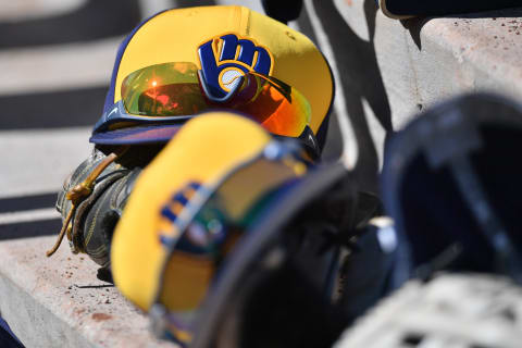 Mar 4, 2018; Phoenix, AZ, USA; A Milwaukee Brewers cap sits in the dugout during the second inning of the game against the Cleveland Indians at Maryvale Baseball Park. Mandatory Credit: Joe Camporeale-USA TODAY Sports