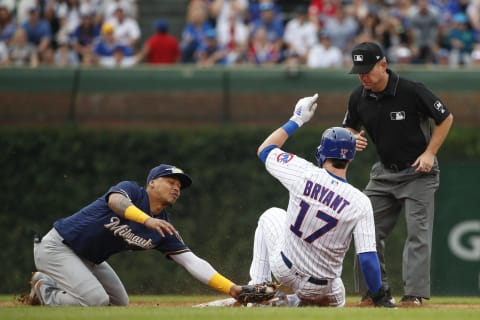 Sep 1, 2019; Chicago, IL, USA; Chicago Cubs third baseman Kris Bryant (17) steals second base against Milwaukee Brewers shortstop Orlando Arcia (3) during the eight inning at Wrigley Field. Mandatory Credit: Kamil Krzaczynski-USA TODAY Sports