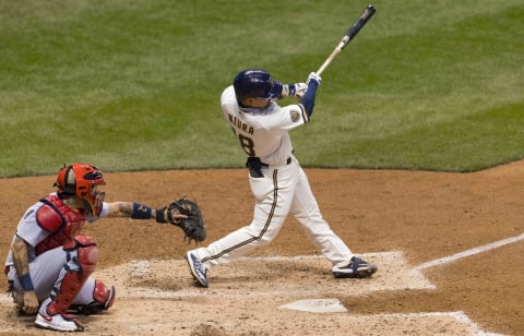 Sep 15, 2020; Milwaukee, Wisconsin, USA; Milwaukee Brewers second baseman Keston Hiura (18) hits a three run home run against the St. Louis Cardinals during the fourth inning at Miller Park. Mandatory Credit: Jeff Hanisch-USA TODAY Sports