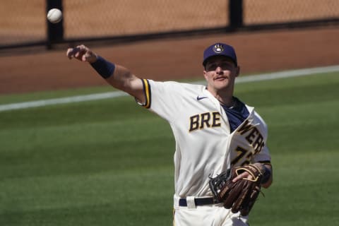 Mar 8, 2021; Phoenix, Arizona, USA; Milwaukee Brewers shortstop Brice Turang (72) makes the throw for an out against the Los Angeles Angels during a spring training game at American Family Fields of Phoenix. Mandatory Credit: Rick Scuteri-USA TODAY Sports