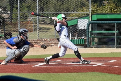 Thousand Oaks High’s Roc Riggio takes a big swing against Westlake during a game on Monday, March 29, 2021. Riggio had his home run streak halted Monday, but the unbeaten Lancers still powered their way to a 14-9 win.Riggio Hr Tear 1