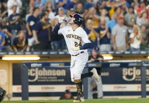 Jun 26, 2021; Milwaukee, Wisconsin, USA; Milwaukee Brewers center fielder Avisail Garcia (24) celebrates after hitting a solo home run during the seventh inning against the Colorado Rockies at American Family Field. Mandatory Credit: Jeff Hanisch-USA TODAY Sports