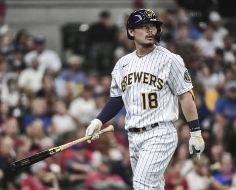 Jul 11, 2021; Milwaukee, Wisconsin, USA; Milwaukee Brewers second baseman Keston Hiura (18) reacts after striking out in the sixth inning during the game against the Cincinnati Reds at American Family Field. Mandatory Credit: Benny Sieu-USA TODAY Sports