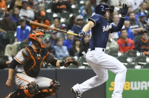 Jun 5, 2017; Milwaukee, WI, USA; Milwaukee Brewers center fielder Brett Phillips (33) hits a single for his first major league hit in the eighth inning during the game against the San Francisco Giants at Miller Park. Mandatory Credit: Benny Sieu-USA TODAY Sports