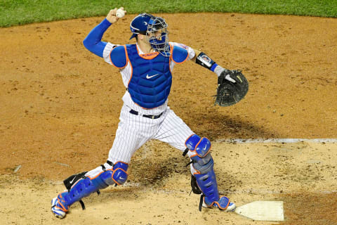 NEW YORK, NY – AUGUST 21: Kevin Plawecki #26 of the New York Mets warms-up between inning against the San Francisco Giants at Citi Field on August 21, 2018 in the Flushing neighborhood of the Queens borough of New York City. (Photo by Steven Ryan/Getty Images)