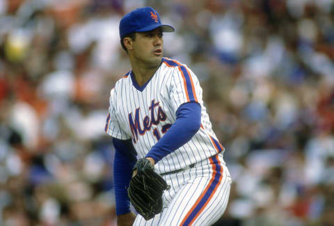 NEW YORK – CIRCA 1986: Ron Darling #12 of the New York Mets pitches during a Major League Baseball game circa 1986 at Shea Stadium in the Queens borough of New York City. Darling played for the Mets from 1983-91. (Photo by Focus on Sport/Getty Images)