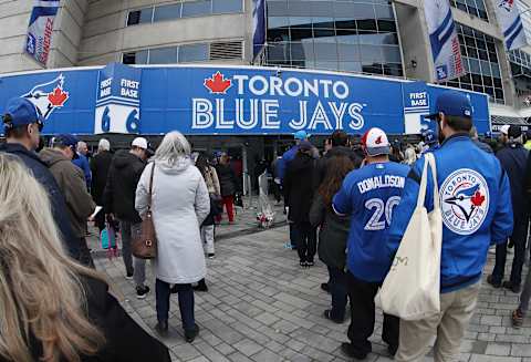 TORONTO, ON – MARCH 28: Fans gather outside the Rogers Centre on Opening Day before the Toronto Blue Jays MLB game against the Detroit Tigers at Rogers Centre on March 28, 2019 in Toronto, Canada. (Photo by Tom Szczerbowski/Getty Images)