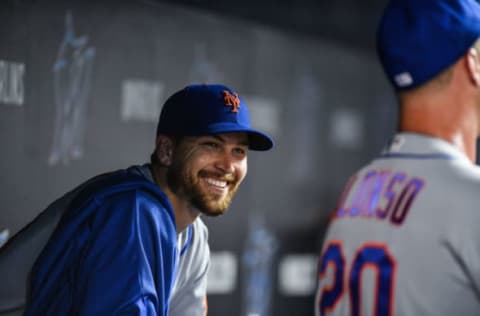 MIAMI, FL – APRIL 03: Jacob deGrom #48 of the New York Mets smiles towards Pete Alonso #20 of the New York Mets in the dugout during the game against the Miami Marlins at Marlins Park on April 3, 2019 in Miami, Florida. (Photo by Mark Brown/Getty Images)