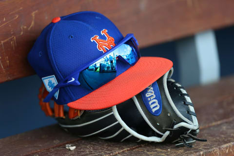 WEST PALM BEACH, FL – MARCH 11: The New Era cap, Nike sunglasses and Wilson glove of Michael Conforto #30 of the New York Mets during a spring training baseball game against the Houston Astros at Fitteam Ballpark of the Palm Beaches on March 11, 2019 in West Palm Beach, Florida. The Astros defeated the Mets 6-3. (Photo by Rich Schultz/Getty Images)