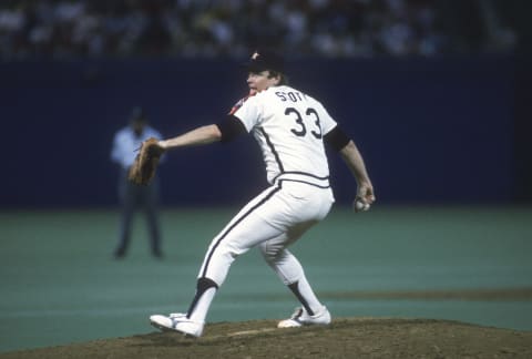 ST. LOUIS, MO – CIRCA 1987: Mike Scott #33 of the Houston Astros pitches against the St. Louis Cardinals during an Major League Baseball game circa 1987 at Busch Stadium in St. Louis, Missouri. Scott played for the Astros from 1983-91. (Photo by Focus on Sport/Getty Images)