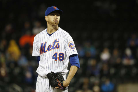 NEW YORK, NEW YORK – APRIL 26: Jacob deGrom #48 of the New York Mets reacts with bases loaded during the second inning against the Milwaukee Brewers at Citi Field on April 26, 2019 in the Flushing neighborhood of the Queens borough of New York City. (Photo by Michael Owens/Getty Images)