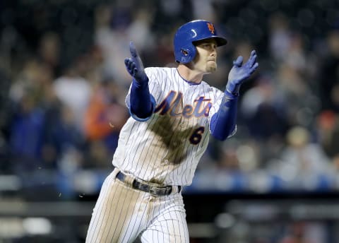 NEW YORK, NEW YORK – APRIL 30: Jeff McNeil #6 of the New York Mets celebrates his single in the 10th inning against the Cincinnati Reds at Citi Field on April 30, 2019 in Flushing neighborhood of the Queens borough of New York City.The New York Mets defeated the Cincinnati Reds 4-3 in 10 innings. (Photo by Elsa/Getty Images)