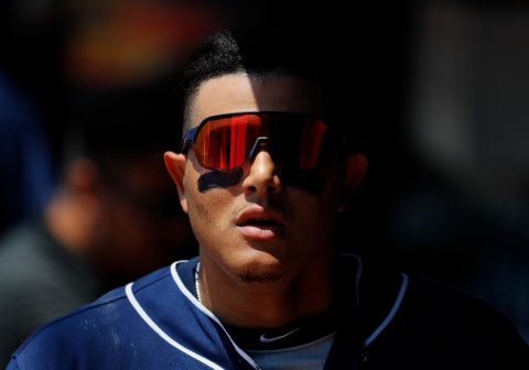 ATLANTA, GEORGIA – MAY 02: Manny Machado #13 of the San Diego Padres reacts after scoring on a RBI single by Wil Myers #4 in the fifth inning against the Atlanta Braves at SunTrust Park on May 02, 2019 in Atlanta, Georgia. (Photo by Kevin C. Cox/Getty Images)