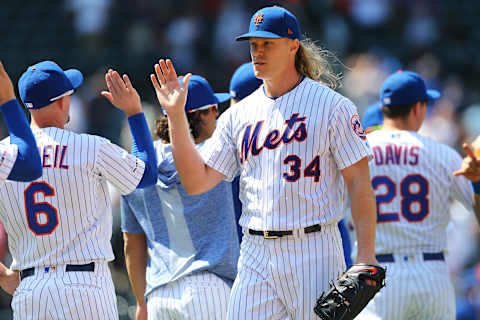 NEW YORK, NEW YORK – MAY 02: Noah Syndergaard #34 of the New York Mets celebrates after pitching a complete game shutout against the Cincinnati Reds at Citi Field on May 02, 2019 in the Queens borough of New York City. New York Mets defeated the Cincinnati Reds 1-0. (Photo by Mike Stobe/Getty Images)