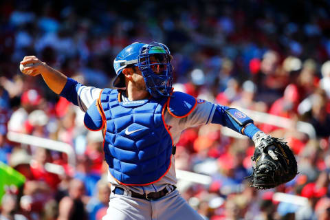 ST. LOUIS, MO – APRIL 21: Travis d’Arnaud #18 of the New York Mets throws the ball against the St. Louis Cardinals at Busch Stadium on April 21, 2019 in St. Louis, Missouri. (Photo by Dilip Vishwanat/Getty Images)