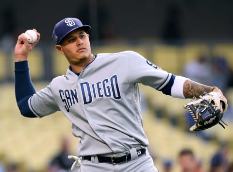 LOS ANGELES, CALIFORNIA – MAY 14: Manny Machado #13 of the San Diego Padres warms up before the game against the Los Angeles Dodgers at Dodger Stadium on May 14, 2019 in Los Angeles, California. (Photo by Harry How/Getty Images)